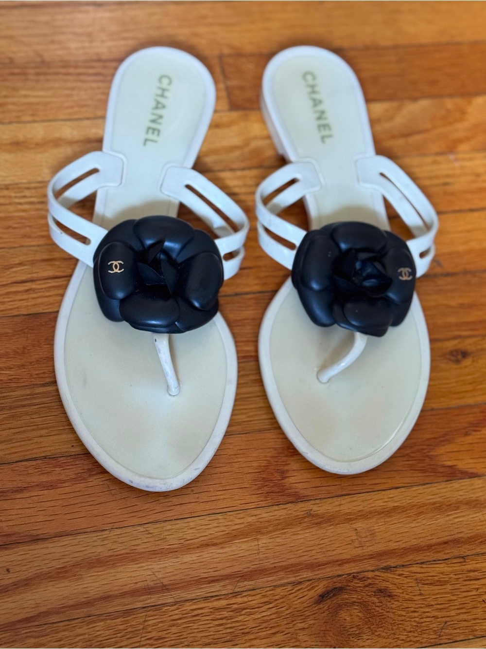 CHANEL White Leather Sandals with Black Camellia Accent